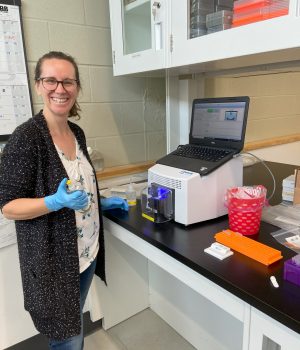 Dr. Cullingham (Project Co-Lead) in the lab preparing samples for exome capture. Credit: Rhiannon Peery